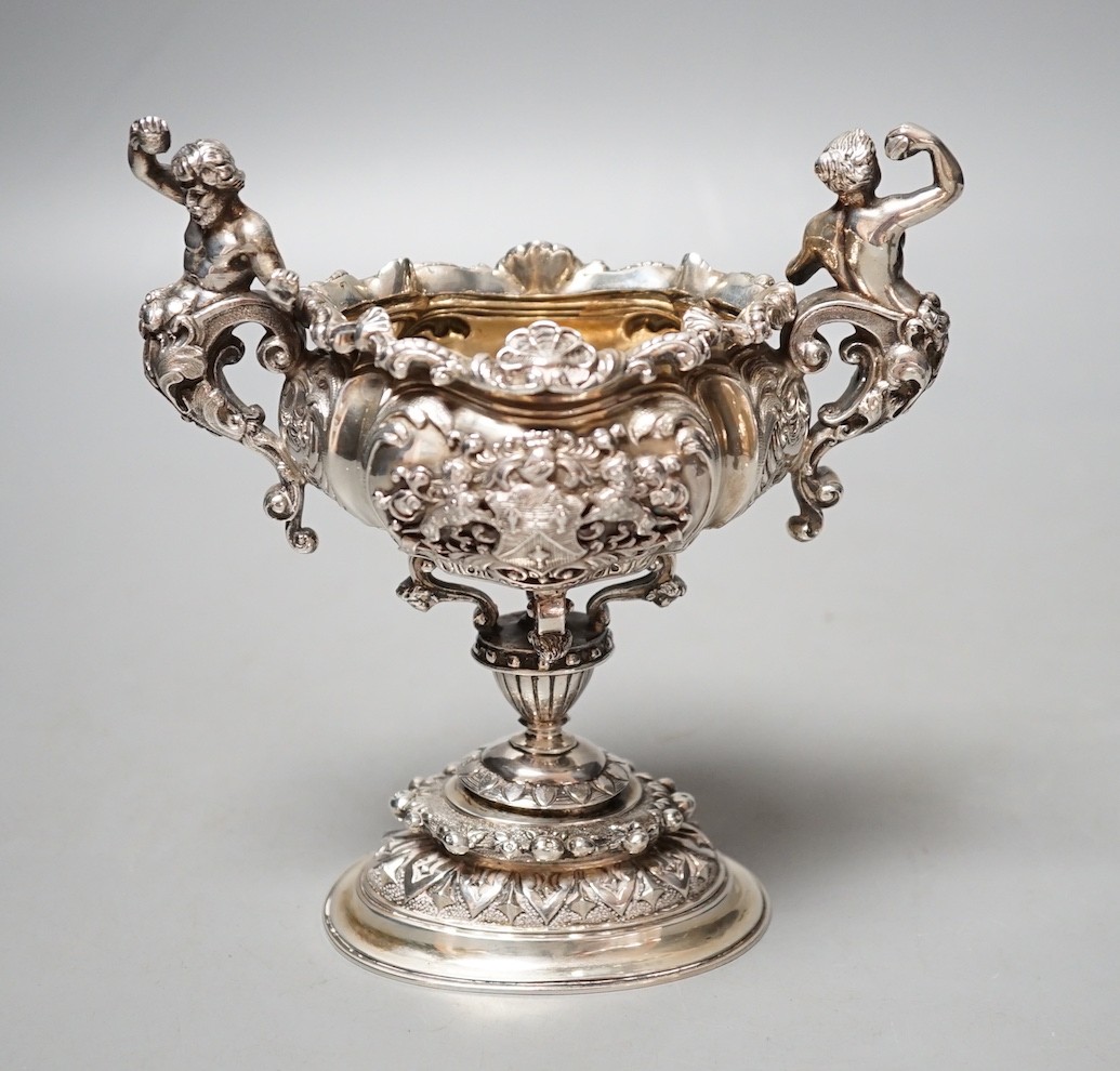 A late Victorian ornate small silver presentation centrepiece, by Carrington & Co, London, 1893, inscribed 'The Salter's Company 500th Anniversary, 1394 April 13th 1894', height 15.1cm, 11.5oz.